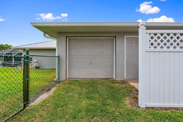 garage with fence