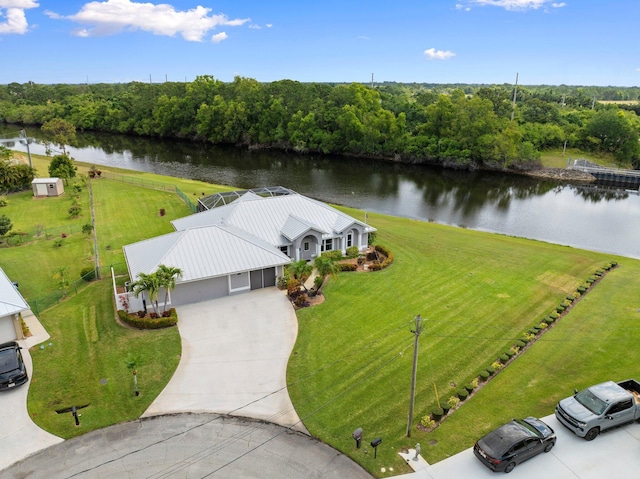 birds eye view of property featuring a water view
