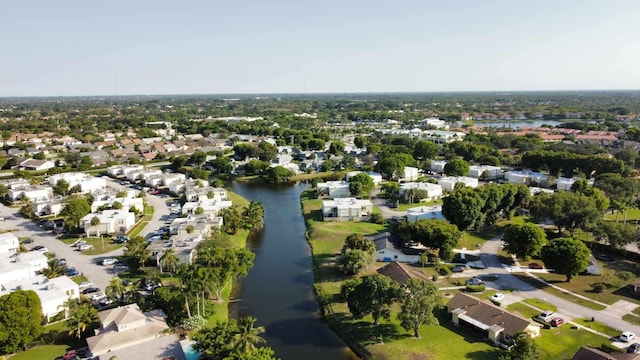 1288 Waterway Cove Dr, Wellington, FL 33414 - aerial view of property's location with nearby suburban area and a nearby body of water