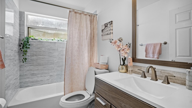 full bath featuring vanity, toilet, and shower / bath combo with shower curtain