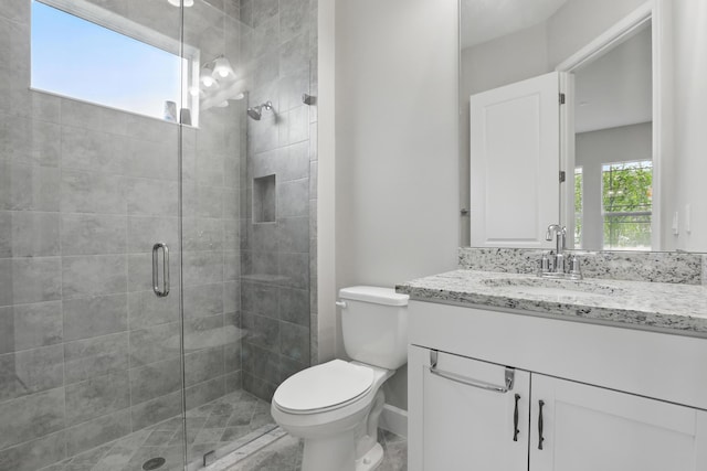 15816 Orchard Dr, Westlake, FL 33470 - bathroom with toilet, a stall shower, vanity, and baseboards