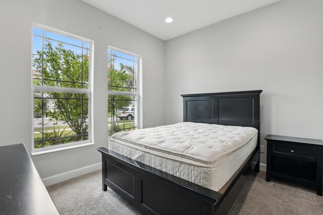 15816 Orchard Dr, Westlake, FL 33470 - bedroom with recessed lighting, light carpet, and baseboards