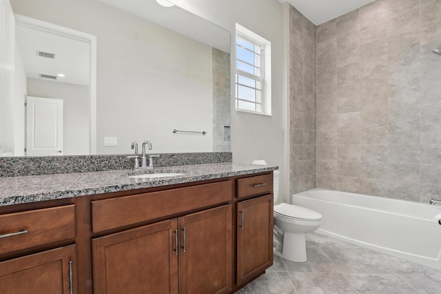 15816 Orchard Dr, Westlake, FL 33470 - bathroom with vanity, toilet, visible vents, tile patterned flooring, and  shower combination