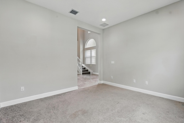 15816 Orchard Dr, Westlake, FL 33470 - spare room featuring stairway, visible vents, baseboards, recessed lighting, and light carpet