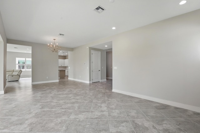 15816 Orchard Dr, Westlake, FL 33470 - empty room featuring recessed lighting, an inviting chandelier, baseboards, visible vents, and light tile patterned flooring