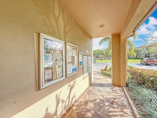 view of patio featuring mail area
