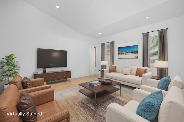 living room featuring recessed lighting, arched walkways, high vaulted ceiling, and baseboards