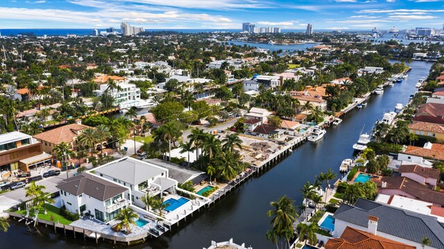 aerial view featuring a residential view and a water view