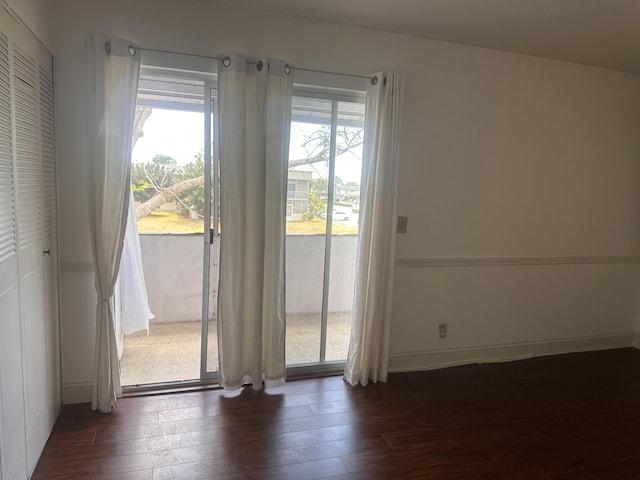 363 Monaco H, Delray Beach, FL 33446 - entryway featuring dark wood-style floors and baseboards