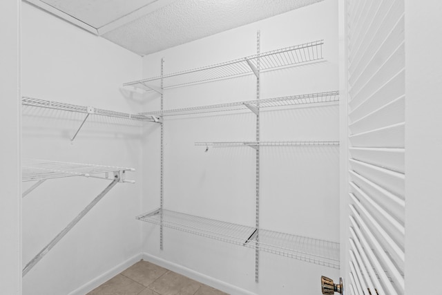 13648 Coconut Palm Ct Unit B, Delray Beach, FL 33484 - spacious closet featuring light tile patterned floors