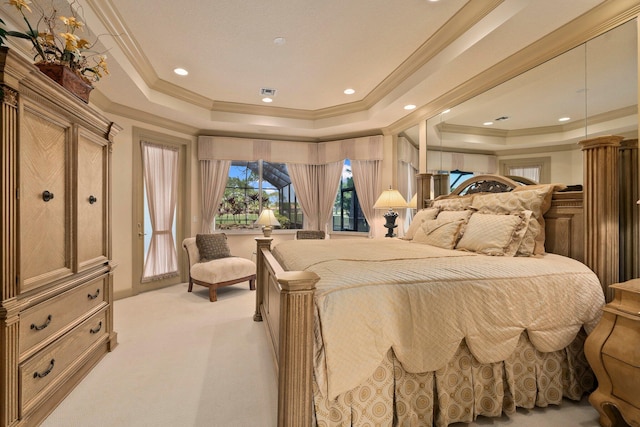bedroom featuring light carpet, ornamental molding, and a raised ceiling
