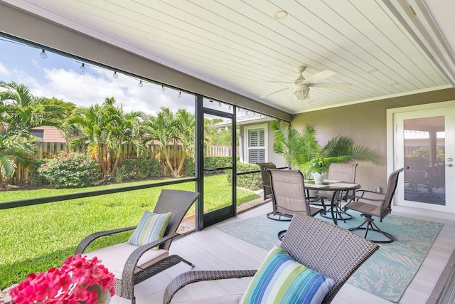 1155 Rainwood Cir, Palm Beach Gardens, FL 33410 - sunroom featuring outdoor dining area and a ceiling fan