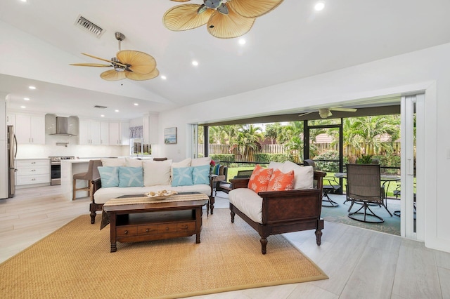 1155 Rainwood Cir, Palm Beach Gardens, FL 33410 - living room featuring ceiling fan, visible vents, vaulted ceiling, recessed lighting, and light wood-style flooring