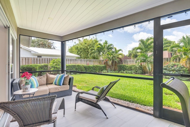 1155 Rainwood Cir, Palm Beach Gardens, FL 33410 - sunroom / solarium featuring an outdoor living space and a wealth of natural light