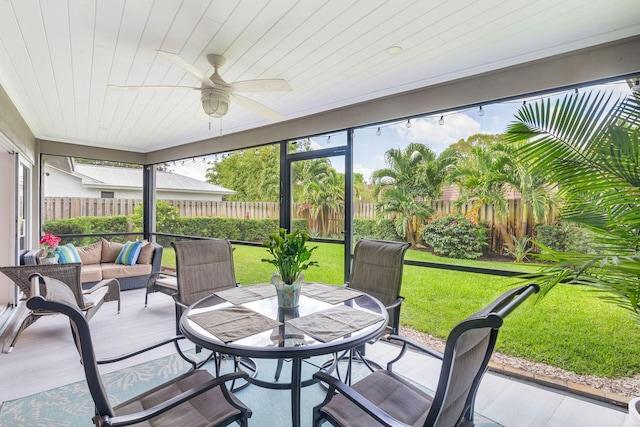 1155 Rainwood Cir, Palm Beach Gardens, FL 33410 - sunroom / solarium featuring a ceiling fan, outdoor dining space, and outdoor lounge area