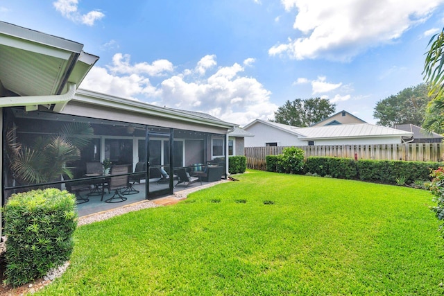 1155 Rainwood Cir, Palm Beach Gardens, FL 33410 - view of yard with a patio, fence, and a sunroom