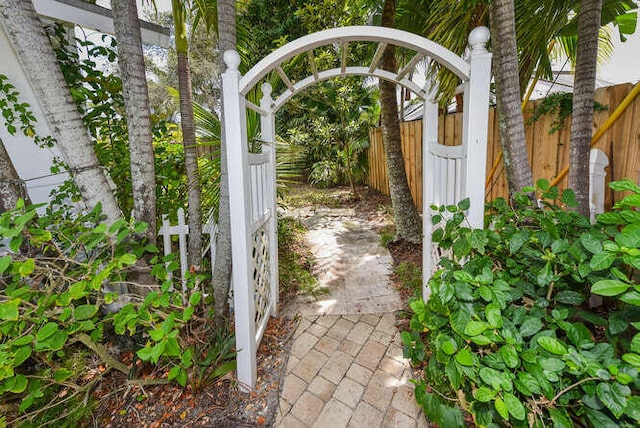 view of gate with fence