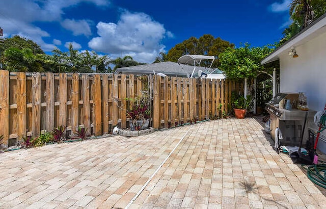view of patio with fence