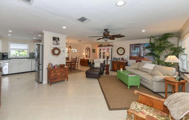 living room with visible vents, ceiling fan, light tile patterned flooring, and recessed lighting