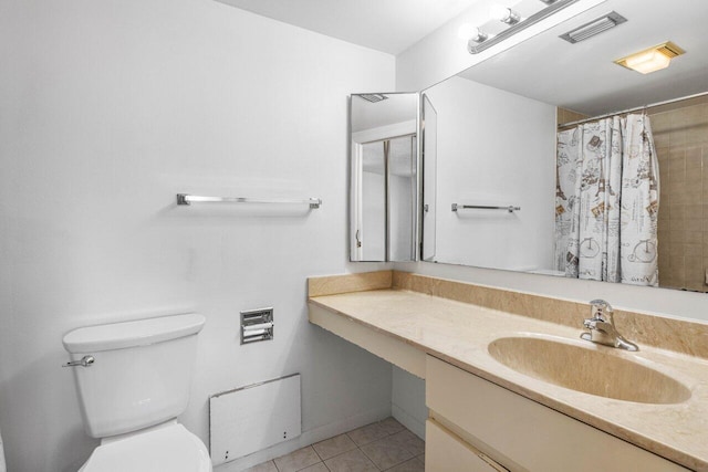 bathroom with visible vents, vanity, curtained shower, toilet, and tile patterned floors