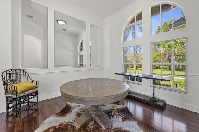3950 Fieldview Way, Wellington, FL 33414 - living area featuring wood finished floors, visible vents, plenty of natural light, and ornamental molding