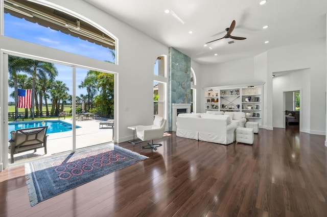 3950 Fieldview Way, Wellington, FL 33414 - living room featuring a towering ceiling, ceiling fan, a healthy amount of sunlight, and recessed lighting