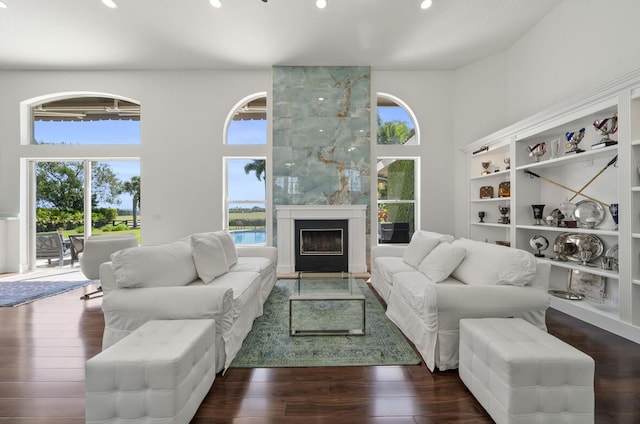 3950 Fieldview Way, Wellington, FL 33414 - living room with a towering ceiling, wood finished floors, and a healthy amount of sunlight