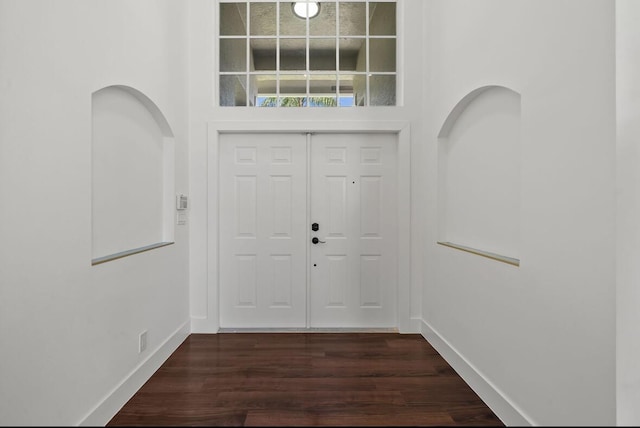 3950 Fieldview Way, Wellington, FL 33414 - foyer featuring a high ceiling, dark wood finished floors, and baseboards
