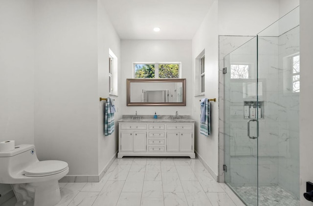 3950 Fieldview Way, Wellington, FL 33414 - bathroom with baseboards, marble finish floor, and a sink