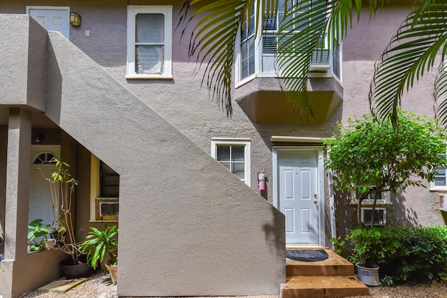 126 Peruvian Ave, Palm Beach, FL 33480 - view of exterior entry with stucco siding
