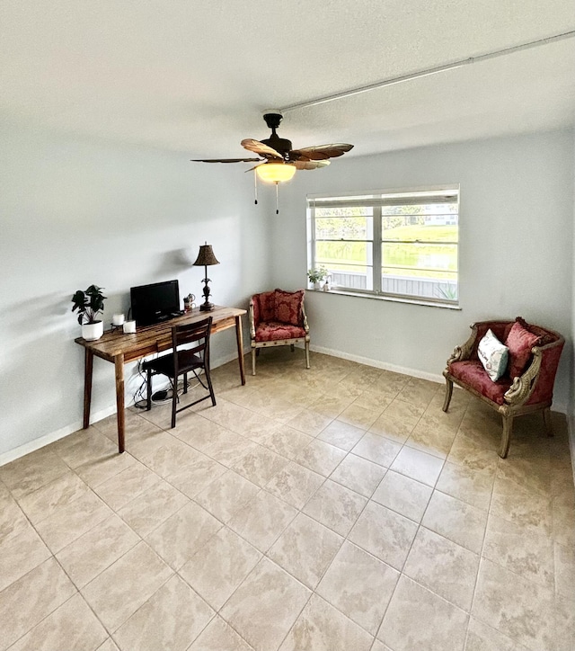 82 Camden Unit D, West Palm Beach, FL 33417 - office area with light tile patterned flooring, ceiling fan, and baseboards