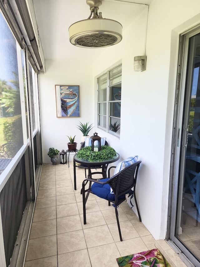 82 Camden Unit D, West Palm Beach, FL 33417 - sunroom / solarium featuring tile patterned floors