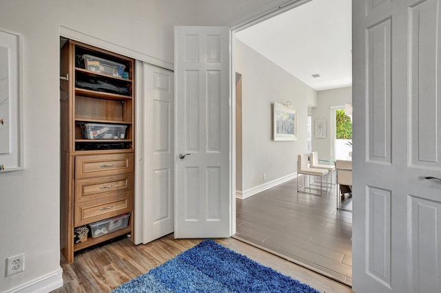 2530 NW 52nd St, Boca Raton, FL 33496 - corridor featuring light wood-style floors and baseboards