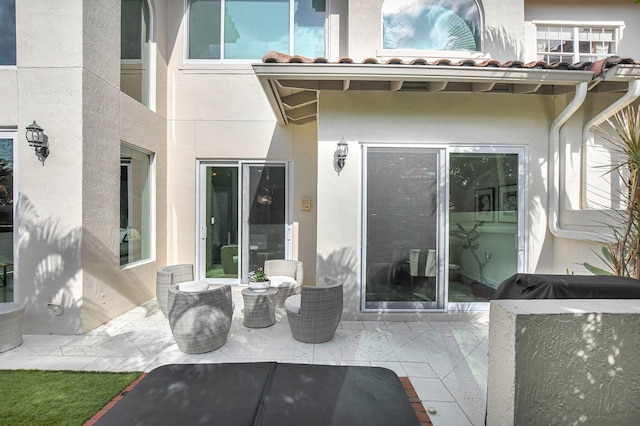 2530 NW 52nd St, Boca Raton, FL 33496 - rear view of property with stucco siding, a patio, and a tiled roof