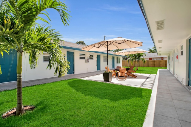 rear view of house featuring a patio