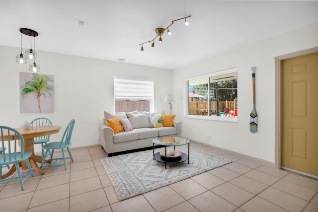 living area with light tile patterned floors