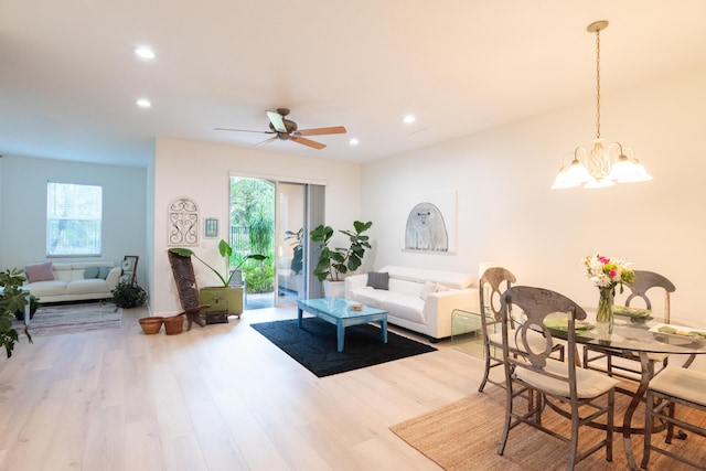 4891 Bonsai Cir Unit 105, Palm Beach Gardens, FL 33418 - living area with recessed lighting, ceiling fan with notable chandelier, and wood finished floors