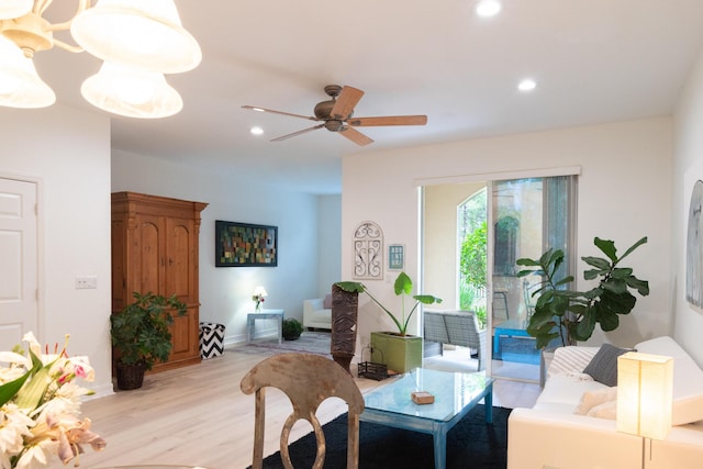 4891 Bonsai Cir Unit 105, Palm Beach Gardens, FL 33418 - living room featuring recessed lighting, a ceiling fan, light wood finished floors, and baseboards