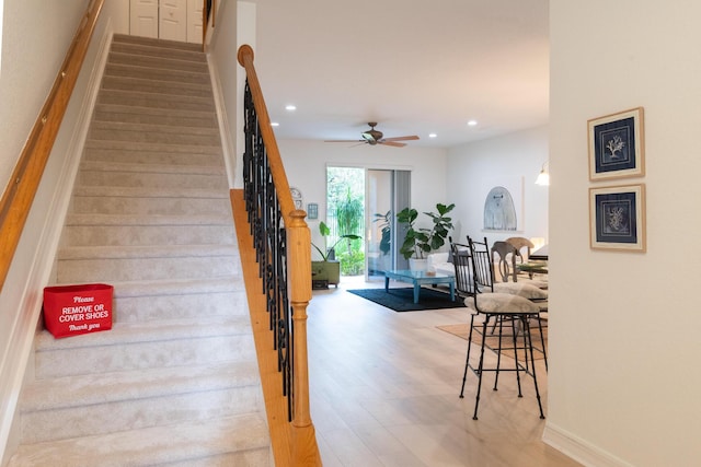 4891 Bonsai Cir Unit 105, Palm Beach Gardens, FL 33418 - stairs with recessed lighting, ceiling fan, and wood finished floors