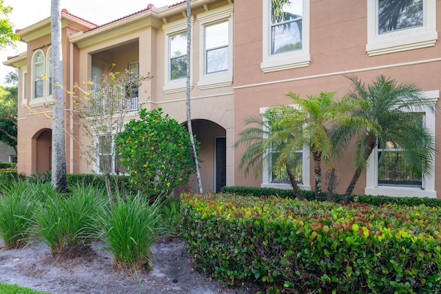 4891 Bonsai Cir Unit 105, Palm Beach Gardens, FL 33418 - view of front of home featuring stucco siding