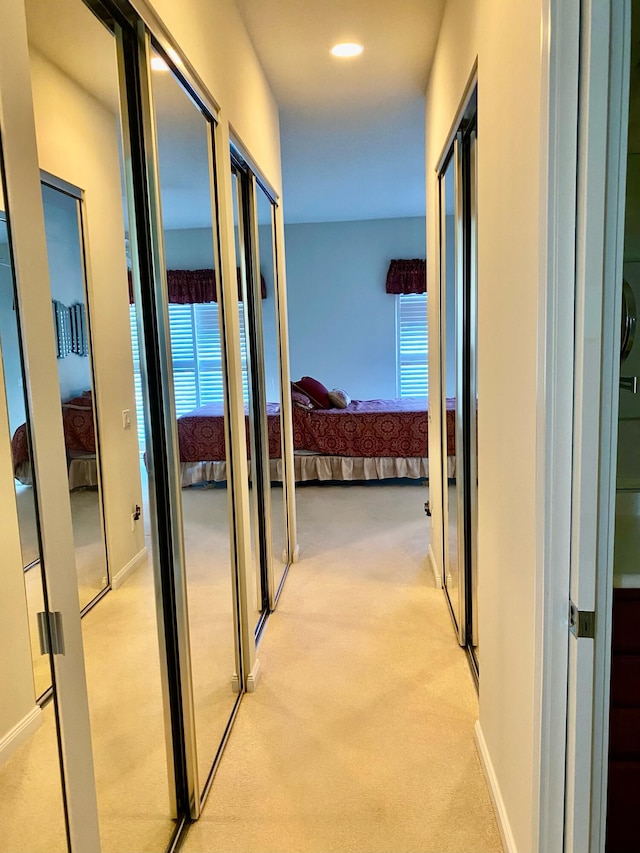 3531 Plume Way SE, Palm Bay, FL 32909 - hallway with plenty of natural light and light carpet