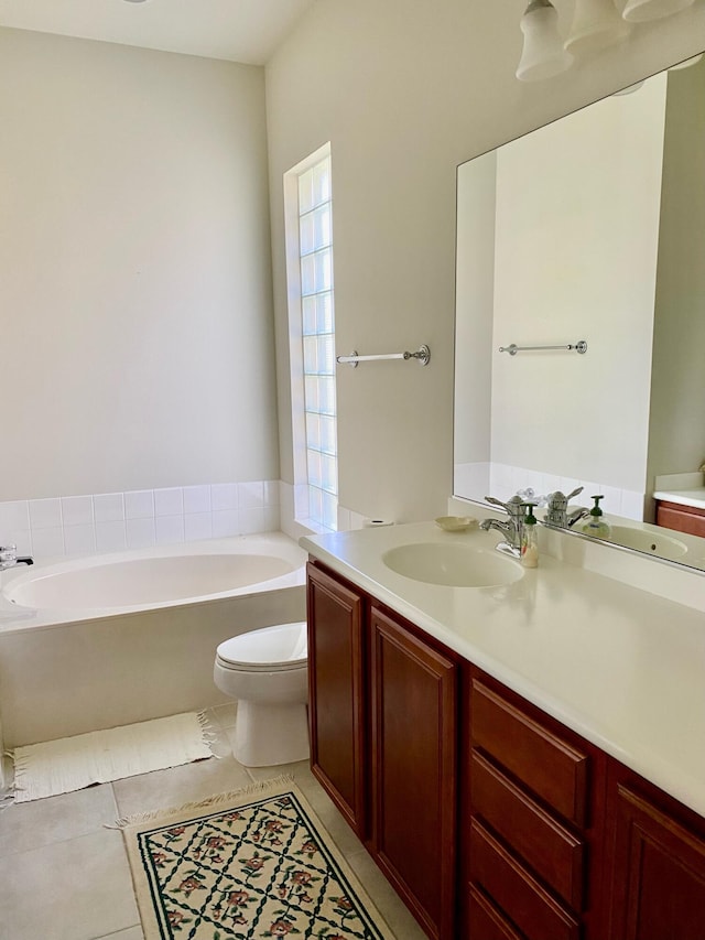 3531 Plume Way SE, Palm Bay, FL 32909 - bathroom featuring toilet, tile patterned floors, a bath, and vanity