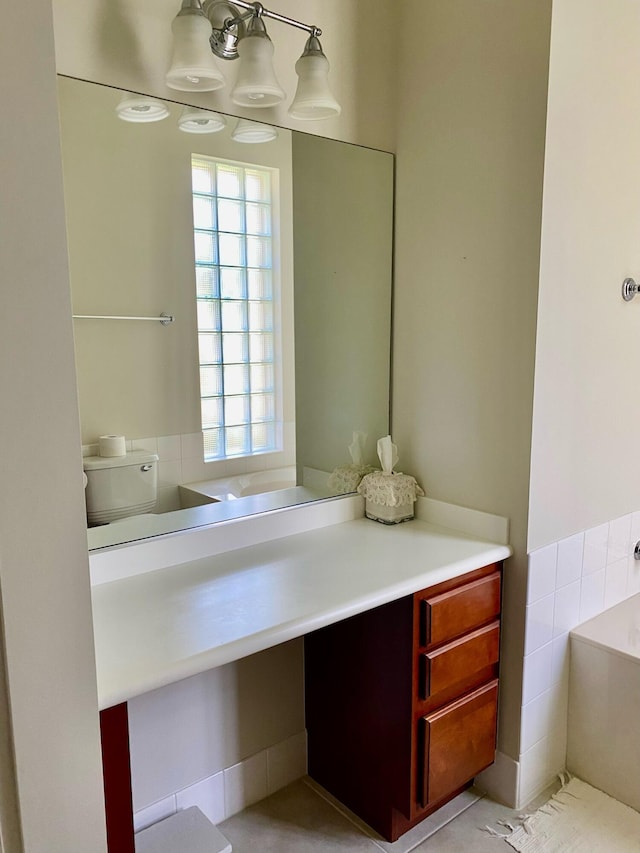 3531 Plume Way SE, Palm Bay, FL 32909 - bathroom featuring vanity, a bath, and toilet