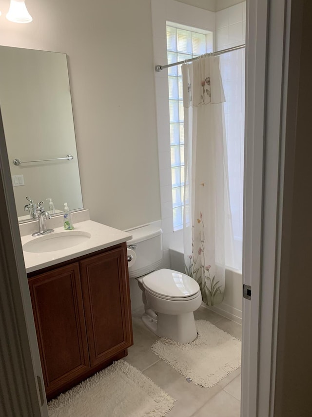 3531 Plume Way SE, Palm Bay, FL 32909 - full bath featuring toilet, tile patterned floors, shower / bathtub combination with curtain, and vanity