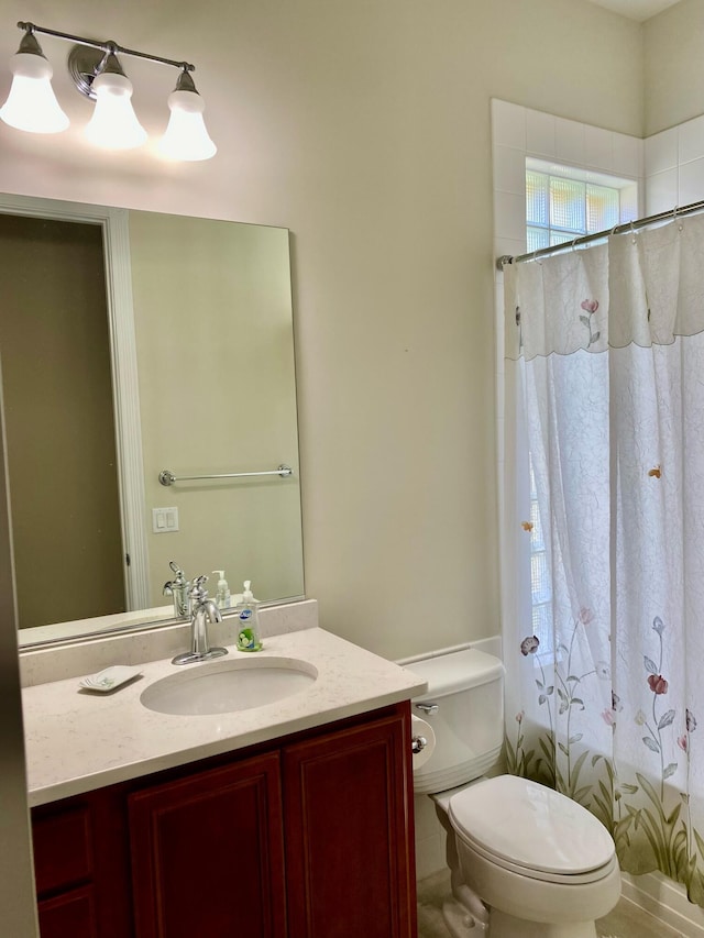 3531 Plume Way SE, Palm Bay, FL 32909 - bathroom featuring vanity, a shower with shower curtain, and toilet