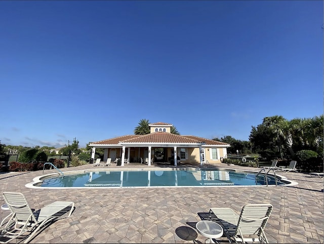 3531 Plume Way SE, Palm Bay, FL 32909 - community pool featuring a patio and fence