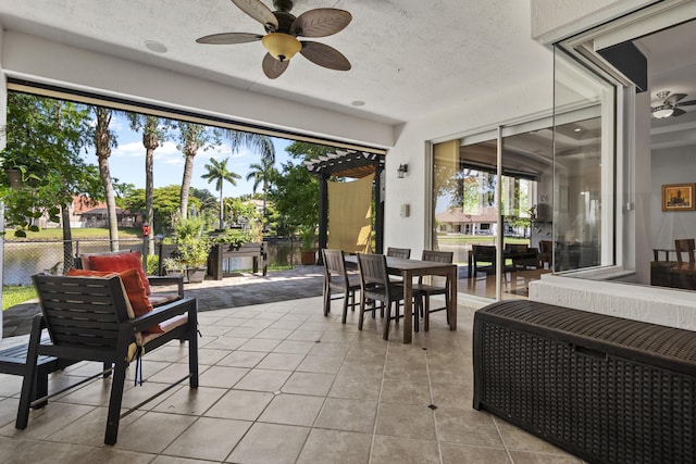 8881 Livingston Way, Boynton Beach, FL 33472 - sunroom featuring tile patterned flooring and ceiling fan