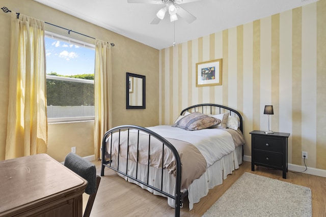 8881 Livingston Way, Boynton Beach, FL 33472 - bedroom with a ceiling fan, baseboards, and light wood-type flooring