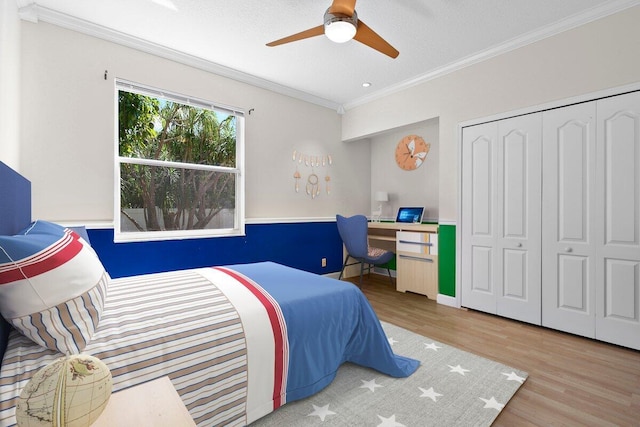 8881 Livingston Way, Boynton Beach, FL 33472 - bedroom with crown molding, ceiling fan, wood finished floors, and a closet