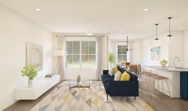 317 Silver Sands Ln Unit 10, Fort Pierce, FL 34945 - living room with wood finished floors, recessed lighting, and baseboards